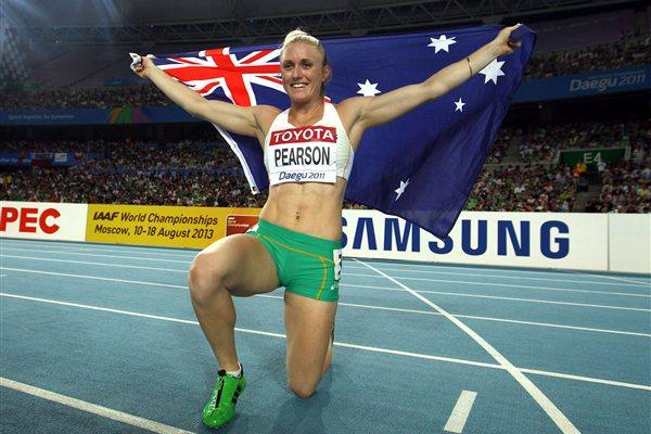Sally Pearson of Australia celebrates victory in the women's 100 metres hurdles final  (Getty images - Bongarts)