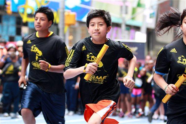 Celebrating the IAAF Centenary in Times Square (Victah Sailer)