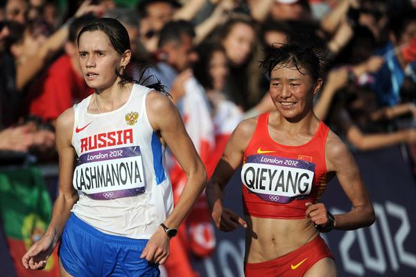 Elena Lashmanova of Russia races to a gold medal in front of Shenjie Qieyang of China who took bronze during the Women's 20km Walk final of the London 2012 Olympic Games on the streets of London on August 11, 2012  (Getty Images)