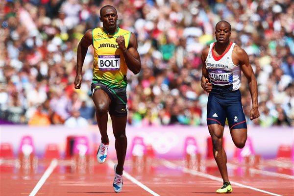 Usain Bolt of Jamaica and James Dasaolu of Great Britain compete in the Men's 100m Round 1 Heats on Day 8 of the London 2012 Olympic Games at Olympic Stadium on August 4 2012 (Getty Images)