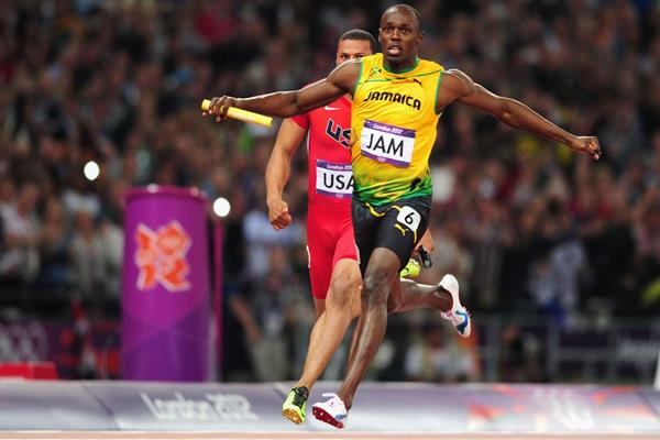 Usain Bolt of Jamaica crosses the finish line ahead of  Ryan Bailey of the United States in the Men's 4 x 100m Relay Final of the London 2012 Olympic Games  on August 11, 2012  (Getty Images)
