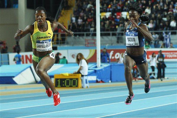 Veronica Campbell-Brown of Jamaica crosses the line to win gold ahead of bronze medalist Tianna Madison of the United States in the Women’s 60 Metres Final during day three - WIC Istanbul (Getty Images)