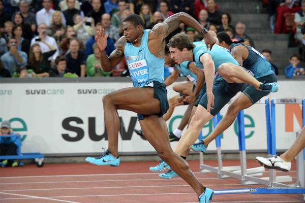 David Oliver on his way to victory in the 110m Hurdles at the 2013 IAAF Diamond League meeting in Zurich (Jiro Mochizuki)