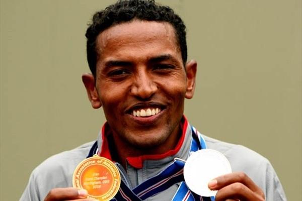 Eritrea's Zersenay Tadese with his individual gold medal and his silver team medal from the IAAF/EDF Energy World Half Marathon Championships in Birmingham (Getty Images)