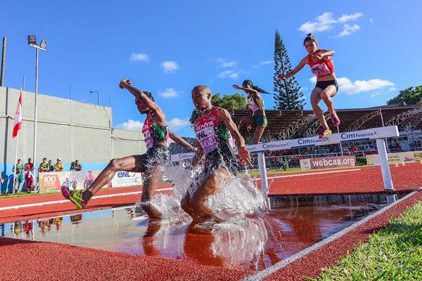 Kenya's Sandra Chebet and Ann Gathoni lead the 2000m steeplechase at the 2015 African Youth Championships (Clyde Koa Wing)