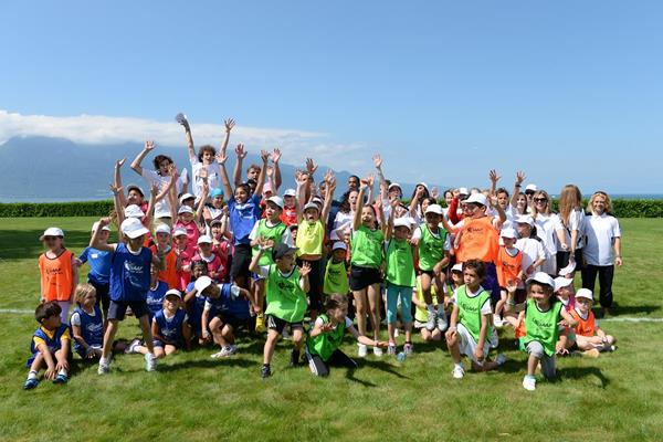 Children and athletes at the IAAF / Nestlé Kids’ Athletics demonstration in Vevey, Switzerland (Jiro Mochizuki)