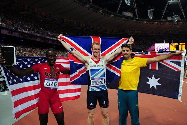 (L-R) Bronze medalist Will Claye of the United States, gold medalist Greg Rutherford of Great Britain and silver medalist Mitchell Watt of Australia celebrate after the Men's Long Jump Final on Day 8 of the London 2012 Olympic Games at Olympic Stadium on August 4, 2012 (Getty Images)