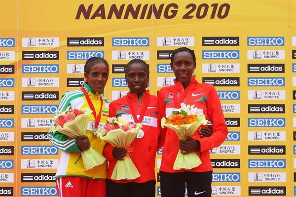 The women's podium in Nanning - runner-up Dire Tune (ETH), champion Florence Kiplagat (KEN), and bronze medallist Peninah Arusei (KEN) (Getty Images)
