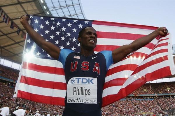 Dwight Phillips of the USA celebrates winning the gold medal in the men's Long Jump final in the historic Berlin Olympic Stadium (Getty Images)
