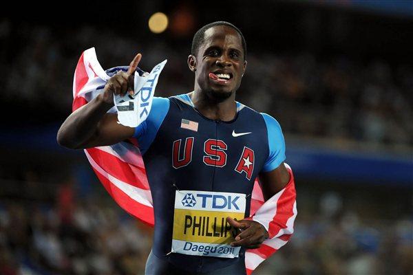 Dwight Phillips of the USA celebrates victory in the men's long jump final (Getty Images)