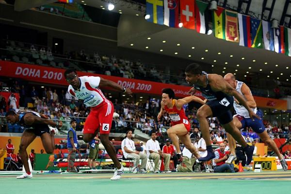 Dayron Robles of Cuba dips to beat Terrence Trammell in the men's 60m Hurdles Final (Getty Images)