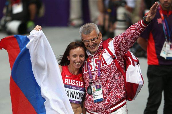 Gold medalist Mariya Savinova of Russia celebrates with her coach Vladimir Kazarin after winning gold in the Women's 800m Final of the London 2012 Olympic Games (Getty Images)