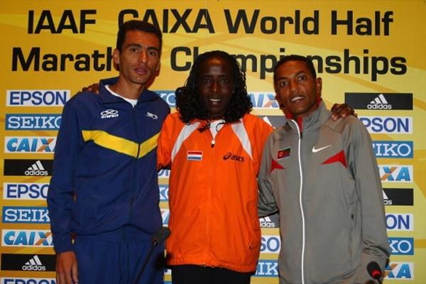 (L-R) Marilson Gomes dos Santos of Brazil, Lornah Kiplagat of the Netherlands and Zersenay Tadese of Eritrea pose during a press conference for the IAAF Caixa World Half Marathon Championships (Getty Images)