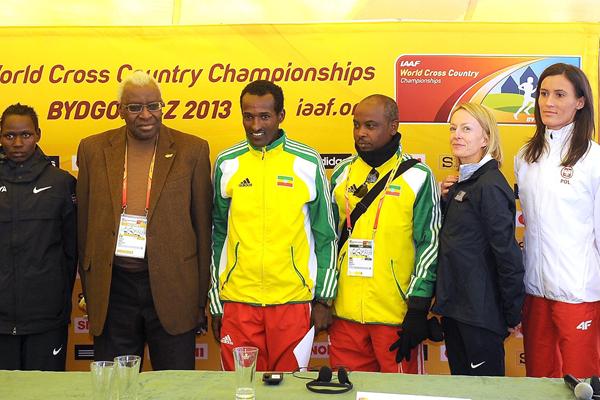 (l to r - Chebet, President Diack, Merga with ETH media attache, Kastor, Kowalska) - Athletes and IAAF President Lamine Diack at the IAAF Press Conference on the eve of the 40th edition of the IAAF World Cross Country Championships in Bydgoszcz, Poland, Saturday 23 March (Getty Images)