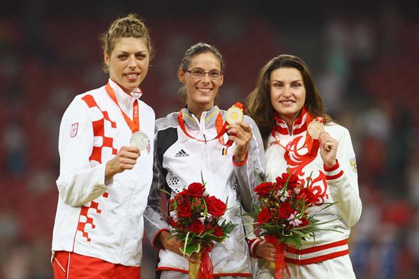 The 2008 Olympic High Jump podium - Tia Hellebaut (centre) with Blanka Vlasic (left) and Anna Chicherova (right) (Getty Images)