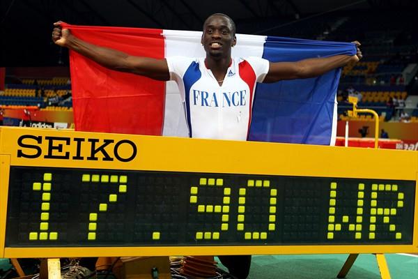 Teddy Tamgho of France with World indoor record scoreboard in Doha (Getty Images)