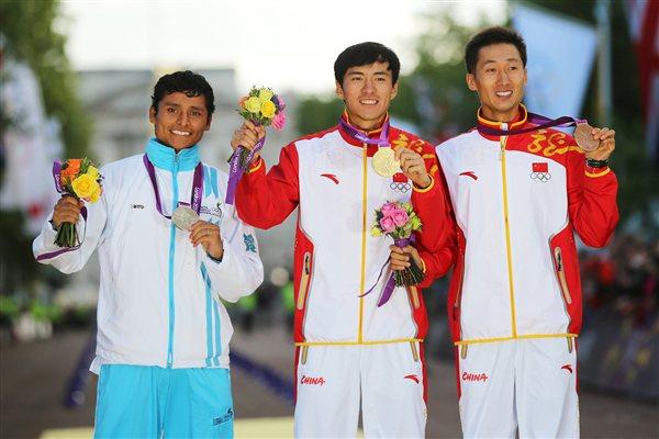 (L-R) Silver medalist Erick Barrondo of Guatemala, gold medalist, Ding Chen of China, and bronze medalist Zhen Wang of China celebrate their medals in the Men's 20k Walk on Day 8 of the London 2012 Olympic Games at Olympic Stadium on August 4, 2012 (Getty Images)