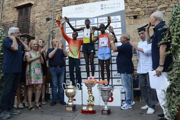 Wilson Kiprop on top of the podium after the 2013 Giro Podistico di Castelbuono (organisers)