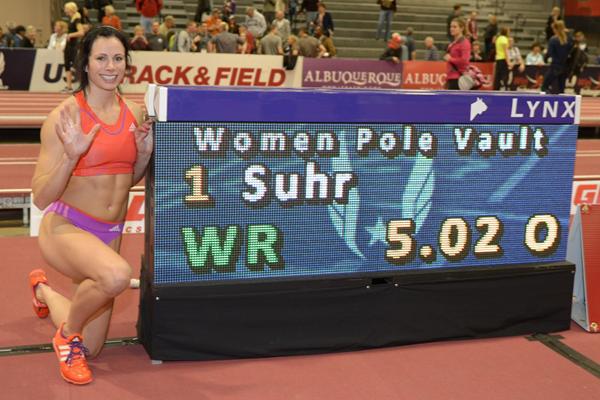 Jenn Suhr next to the scoreboard after breaking the World indoor Pole Vault record with 5.02m (Kirby Lee)