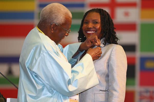 Pauline Davis-Thompson receives an IAAF Veteran Pin at the 49th IAAF Congress in Moscow (IAAF)