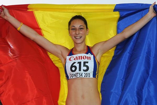 Florentina Marincu celebrates after winning the triple jump at the 2013 World Youth Championships (Getty Images)