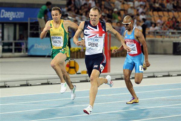 David Greene (C) of Great Britain celebrates after crossing the finish line and claiming gold ahead of L.J. van Zyl (L) of South Africa and Felix Sanchez of Dominican Republic in the men's 400 metres hurdles final (Getty Images)
