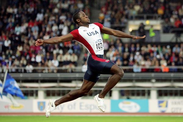 USA's Dwight Phillips on his way to gold at the 2005 IAAF World Championships in Helsinki (Getty Images)