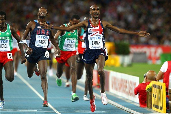 Mohamed Farah of Great Britain celebrates as he crosses the finish line ahead of Bernard Lagat of the USA to claim victory in the men's 5000 metres final  (Getty Images)