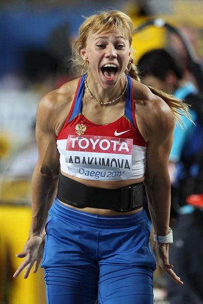 Maria Abakumova of Russia celebrates victory in the women's javelin throw final (Getty Images)