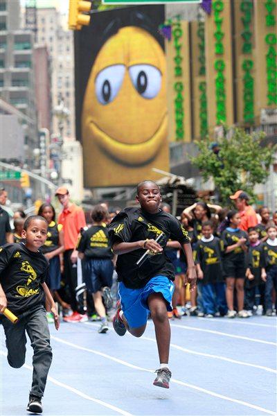 Celebrating the IAAF Centenary in Times Square - New York City style (Victah Sailer)
