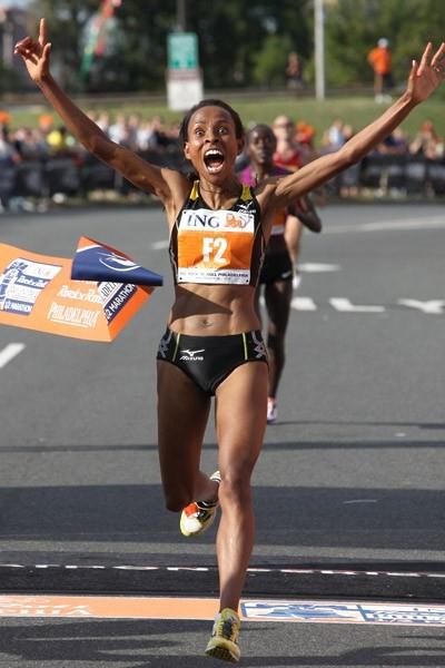 A happy debutante indeed! Meseret Defar takes the Philadelphia Half Marathon in 1:07:44 (Victah Sailer)
