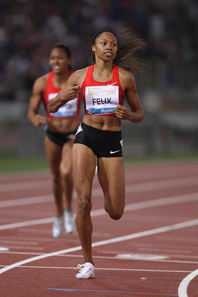 Allyson Felix crosses the line in the 400m in Rome (Giancarlo Colombo)