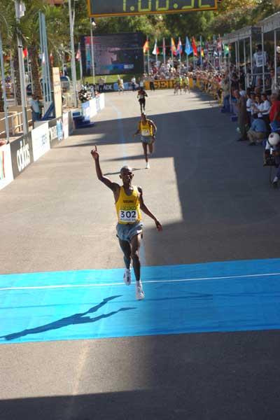 Fabiano Joseph crosses the finish line (IAAF)