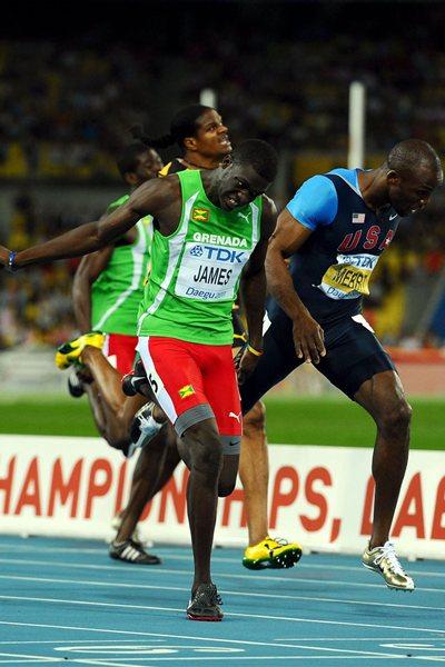 Kirani James of Grenada crosses the finish line ahead of LaShawn Merritt (R) of United States in the men's 400 metres final  (Getty Images)