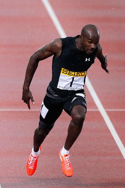 Kim Collins of St Kitts & Nevis in action in the 100m (Getty Images)