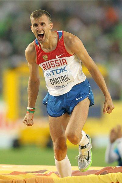 Aleksey Dmitrik of Russia celebrates his second place during the men's high jump final (Getty Images)