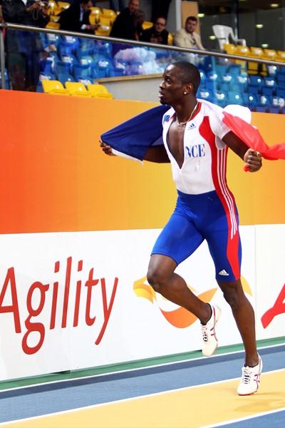 An agile Teddy Tamgho of France celebrates his new World indoor record in the Men's Triple Jump with lap of honour (Getty Images)