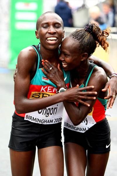 World Half Marathon champion Mary Keitany (R) congratulates team mate Philes Ongori on her silver medal winning performance (Getty Images)