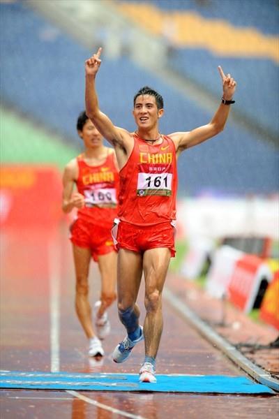 A quick stroll in the rain - Li Jianbo wins the 20km (Jiro Mochizuki)