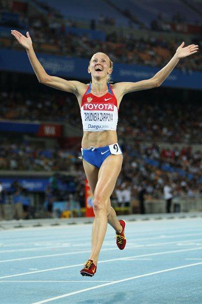 Yuliya Zaripova of Russia celebrates claiming gold in the women's 3000 metres steeplechase final during day four (Getty Images)