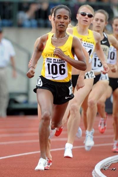 Gelete Burka (ETH) on her way to narrow 3:59.89 win over 1500m in Eugene (Kirby Lee)