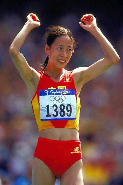 Liping Wang seen winning the women's Olympic 20km Race Walk - she was one of the guest speakers at the 2008 International Race Walking Forum, Beijing (Getty Images)