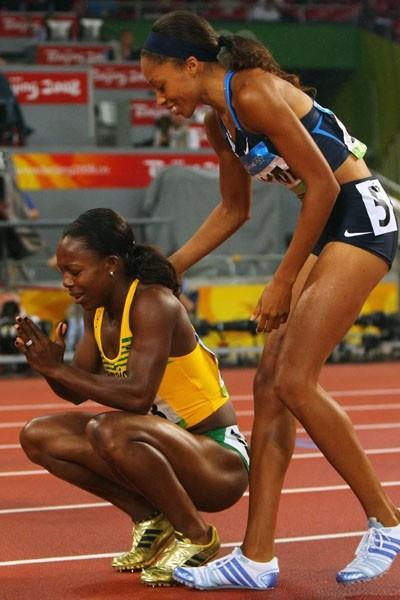 Allyson Felix congratulates Olympic champion Veronica Campbell-Brown after finishing second in Beijing (Getty Images)