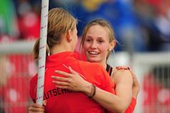 Gold medal winner Desiree SINGH of Germany is congratulated by team mate Franziska Kappes (l) after the Girls Pole Vault final - Day Four - WYC Lille 2011 (Getty Images)