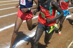 Kenya's national junior cross country champion John Kemboi (with neck chain) leads the boys 5000m at the Kenyan national high schools championships in Eldoret (David Macharia)