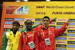 Ayad Lamdassem of Spain with Meselech Melkamu (ETH) and Linet Chepkurui (KEN) at the IAAF World Cross Country Championships Press Conference in Punta Umbria (Getty Images)