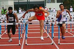 Lu Jiateng (China) leading his way to 110m hurdles victory (Freelance)