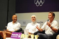 Namibian sprinter Frank Fredericks (left), with fellow Olympians Egyptian swimmer Rania Elwani and French cyclist Frederic Magne at Chat with Champions at the Youth Olympic Village in Singapore (SPH-SYOGOC/ Dominic Wong)