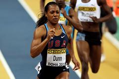 USA's Debbie Dunn wins her 400m heat in Doha (Getty Images)