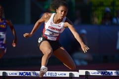 Kori Carter smashes her PB with a 53.21 win in the 400m Hurdles at the 2013 NCAA Championships (Kirby Lee)